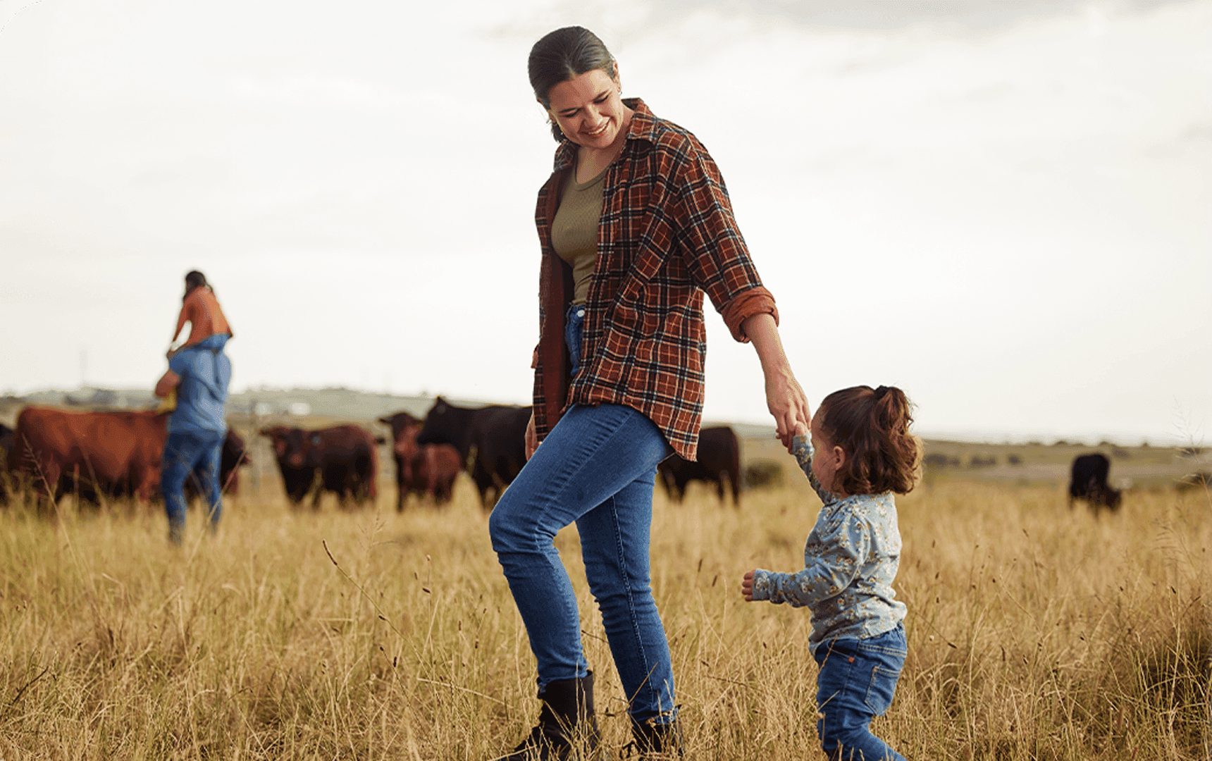 Farm family enjoying time outdoors after being ensured by ag finance loans